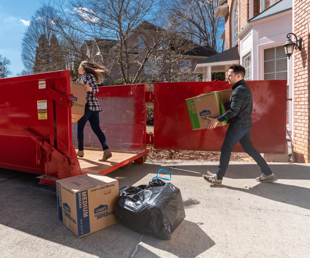 Roll-off dumpster in a residential driveway